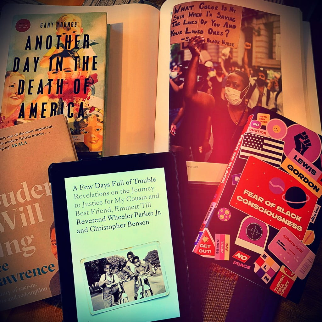 A Few Days Full of Trouble seen with Lee Lawrence's book The Louder I Will Sing, Gary Younge's Another Day in the Death of America, Professor Lewis R. Gordon's Fear of Black Consciousness and Mitch Epstein's photo of a woman holding a placard during a Black Lives Matter protest from Property Rights book