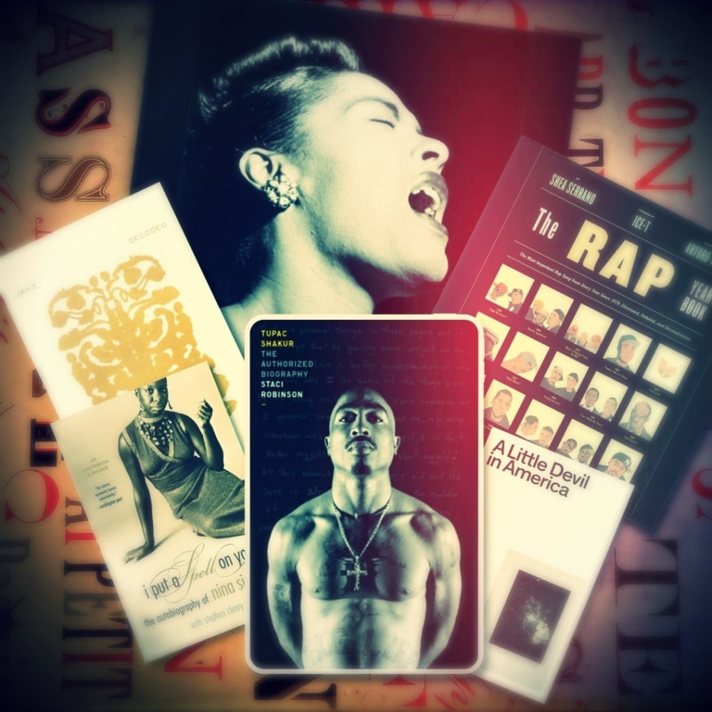 Tupac Shakur "The Authorized Biography" on table in front of books "I Put A Spell on You" by Nina Simone, "Decoded" by Jay-Z, "A Little Devil in America" by Hanif Abdurraqib, "The Rap Year Book" by Ice T. et al., and a black and white image of Billie Holiday.