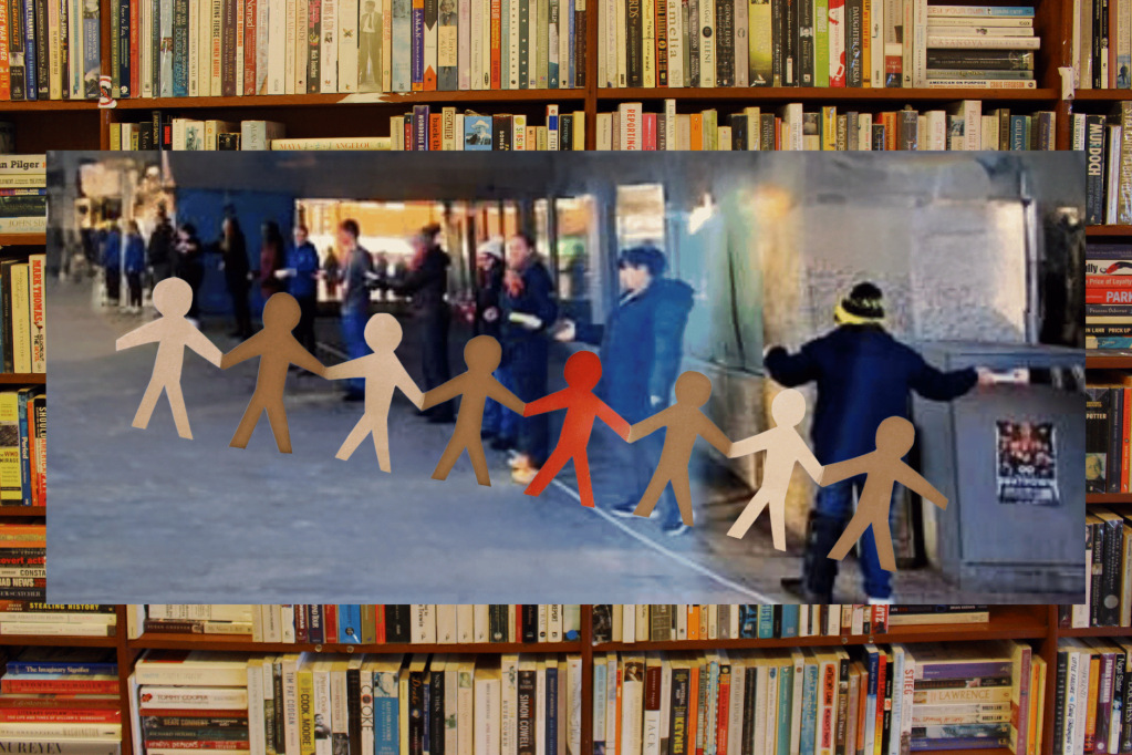 Hundreds form human chain to help move 15,000 books