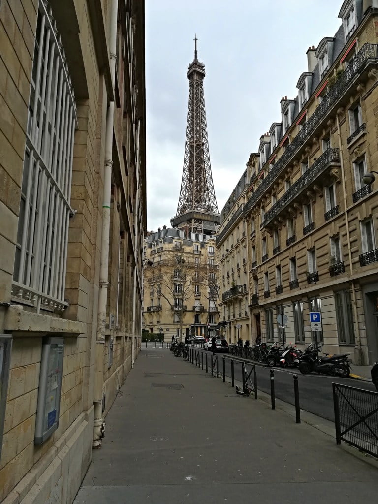 View of Eiffel Tower in front of American Library in Paris.