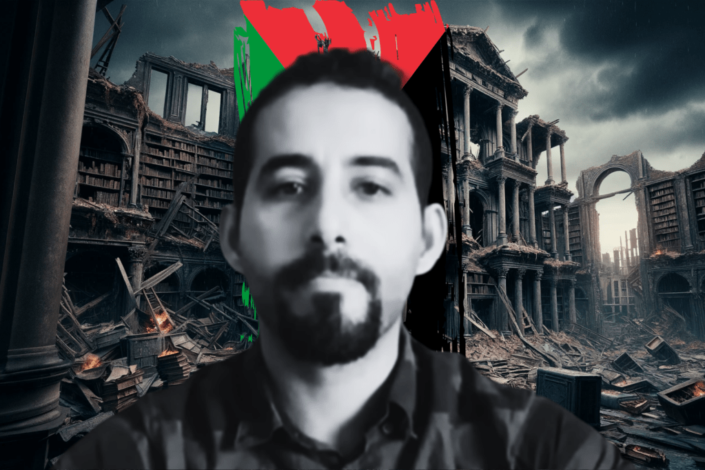 Mosab Abu Toha in black and white in front of bombed out library and Palestinian flag.