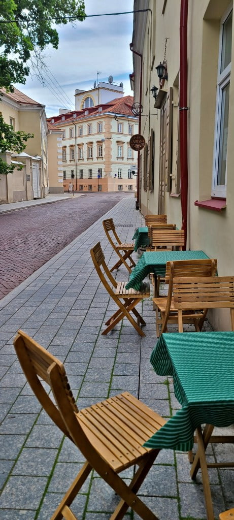 Vilnius literary tour cafe chairs outside on the street