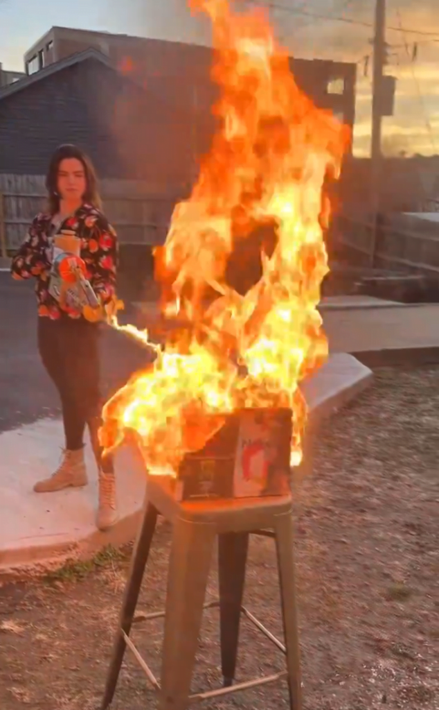 Missouri Republican candidate Valentina Gomez burns LGBTQ books in video using a flamethrower.
