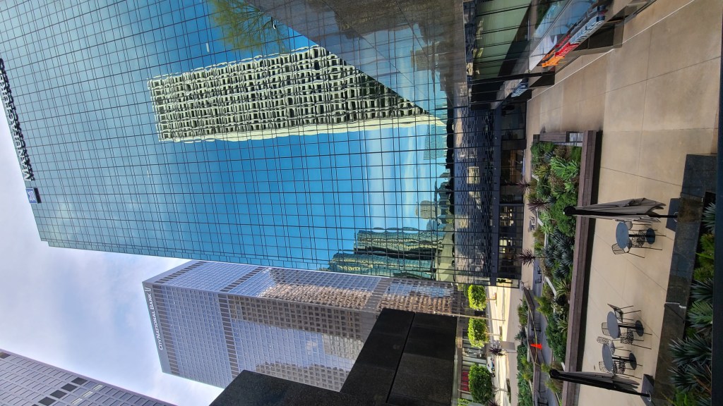 Los Angeles literary tour. Skyscraper reflection seen on another skyscraper.